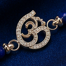 Divine ॐ (Om) Aura Rakhi – Pure 925 Sterling Silver (Color of Thread May Vary)